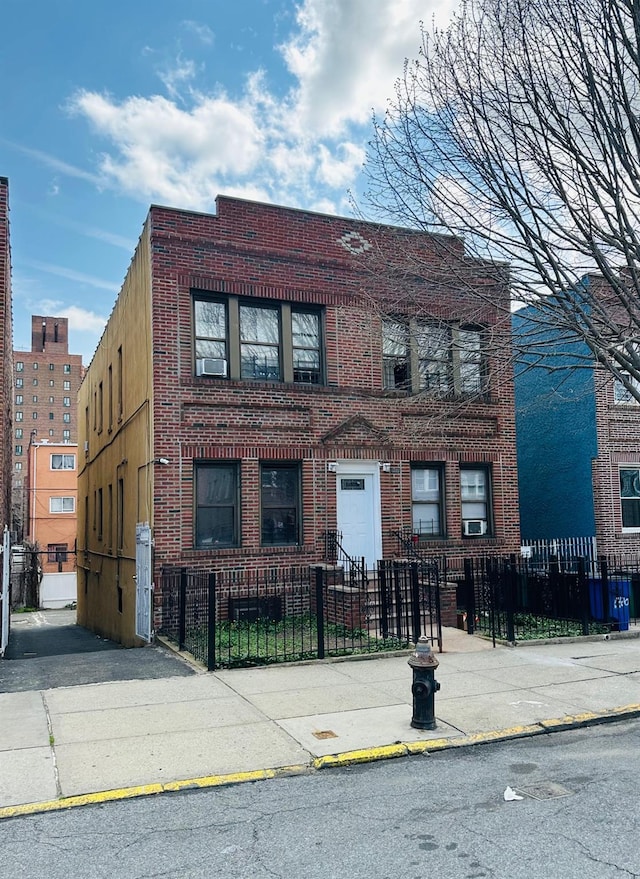 1420 Leland Ave, Bronx, NY 10460 - view of front of home featuring brick siding and a fenced front yard