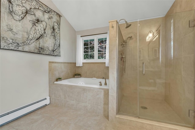 bathroom featuring a shower stall, tile patterned flooring, vaulted ceiling, a baseboard radiator, and a garden tub