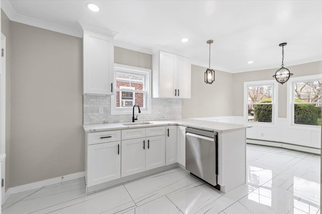 kitchen featuring a sink, dishwasher, white cabinetry, baseboards, and a baseboard radiator