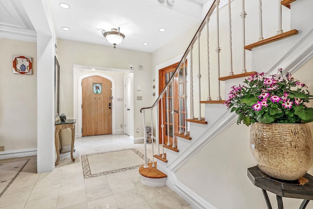 5235 Netherland Ave, Bronx, NY 10471 - entryway with stairs, recessed lighting, baseboards, inlaid floor details, and arched walkways