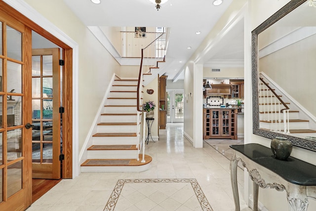 5235 Netherland Ave, Bronx, NY 10471 - entrance foyer with stairway, recessed lighting, french doors, baseboards, and ornamental molding