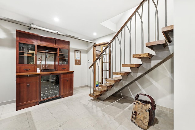 5235 Netherland Ave, Bronx, NY 10471 - bar with wine cooler, stairway, baseboards, and recessed lighting
