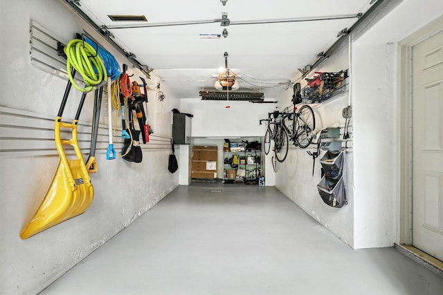 5235 Netherland Ave, Bronx, NY 10471 - garage featuring a garage door opener