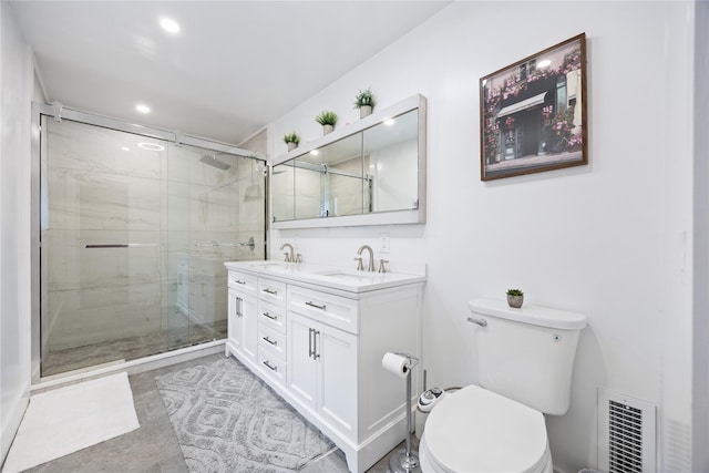 bathroom featuring a shower stall, a sink, toilet, visible vents, and recessed lighting