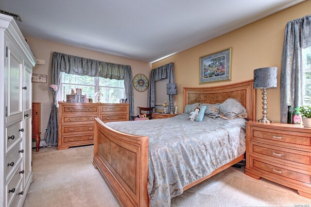 150 N Woods Dr, Wading River, NY 11792 - bedroom with light colored carpet