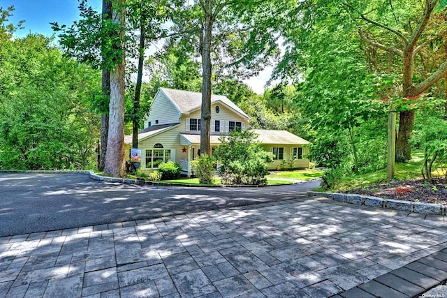 150 N Woods Dr, Wading River, NY 11792 - view of side of home with driveway