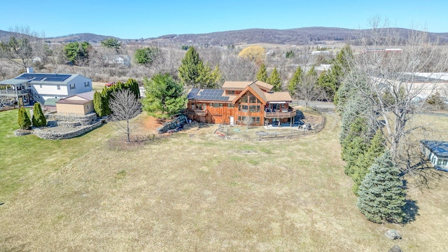 drone / aerial view featuring a mountain view