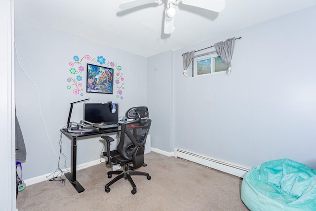 office space with carpet floors, baseboards, baseboard heating, and a ceiling fan