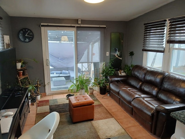 living room with light tile patterned floors