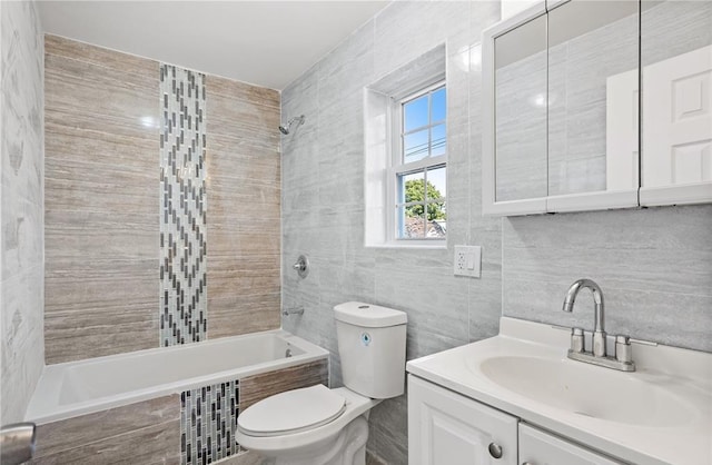 191-68 115th Rd, Saint Albans, NY 11412 - full bathroom featuring tile walls, tiled shower / bath combo, toilet, vanity, and decorative backsplash