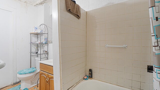 1222 Taylor Ave, Bronx, NY 10472 - full bathroom with bathtub / shower combination, vanity, a textured ceiling, and toilet