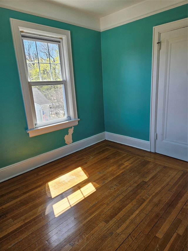 182 Parkway N, Yonkers, NY 10704 - empty room featuring baseboards and hardwood / wood-style floors