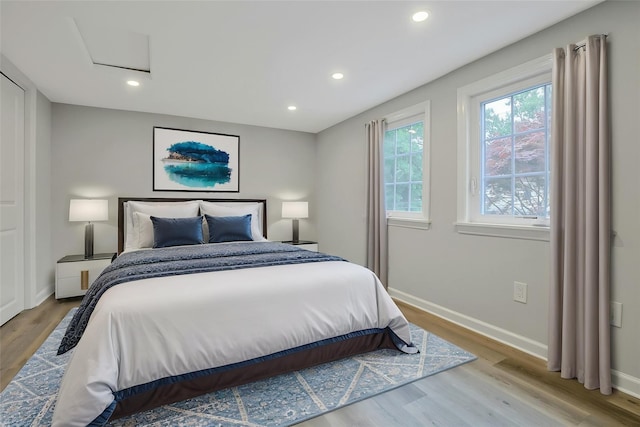 286 9th St, Verplanck, NY 10596 - bedroom with baseboards, light wood finished floors, recessed lighting, and attic access