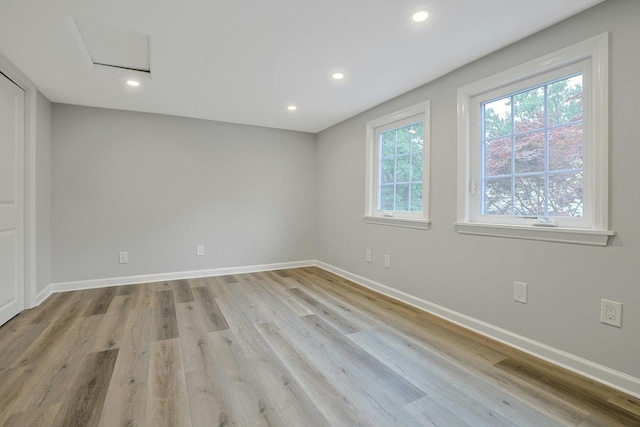 286 9th St, Verplanck, NY 10596 - empty room with recessed lighting, baseboards, attic access, and light wood-type flooring