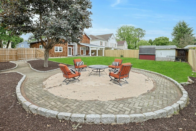 286 9th St, Verplanck, NY 10596 - view of patio with a fire pit and an outdoor structure