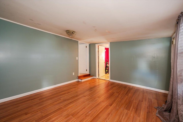 92 Nebraska St, Long Beach, NY 11561 - unfurnished room with baseboards and wood finished floors