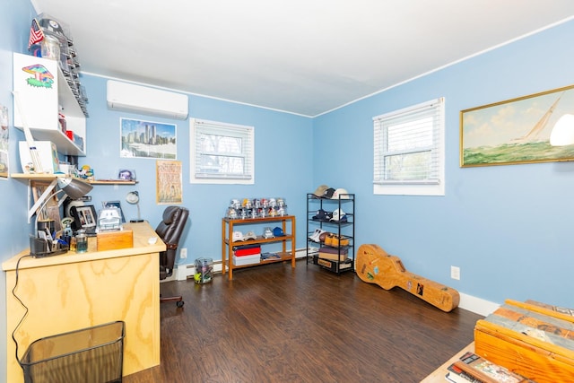 home office featuring baseboards, wood finished floors, and a wall mounted AC