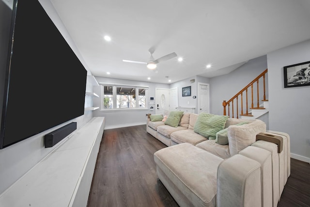 living room featuring a ceiling fan, baseboards, recessed lighting, and stairs