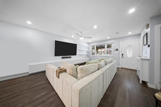 living room with a baseboard heating unit, a ceiling fan, recessed lighting, and dark wood-style flooring