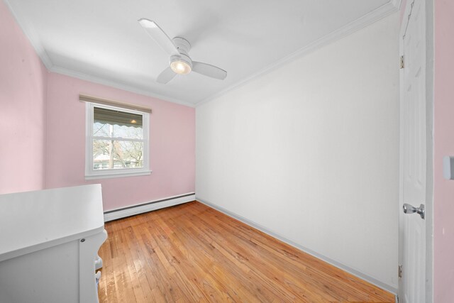4038 Murdock Ave, Bronx, NY 10466 - unfurnished bedroom featuring a baseboard radiator, ornamental molding, light wood finished floors, a ceiling fan, and baseboards