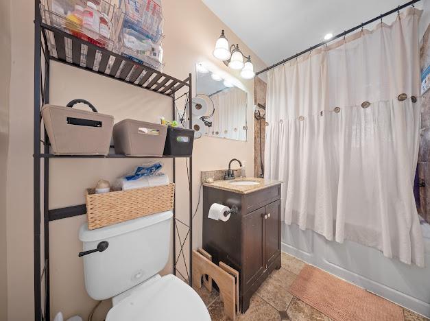 4038 Murdock Ave, Bronx, NY 10466 - bathroom with shower / bath combo with shower curtain, toilet, and vanity