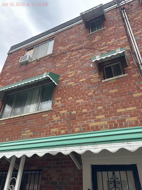 3234 Wickham Ave, Bronx, NY 10469 - view of side of home with brick siding