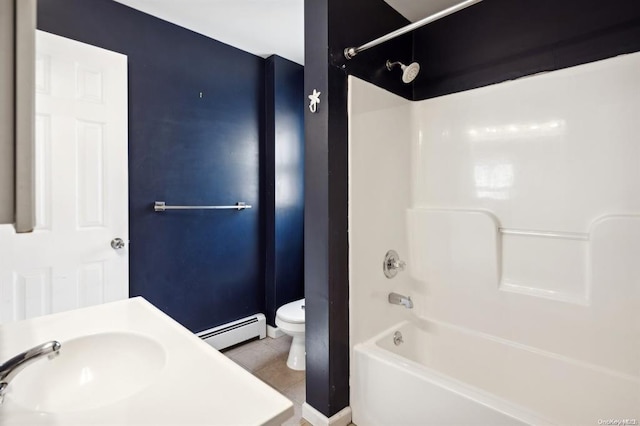 bathroom featuring a sink, a baseboard radiator, toilet, shower / washtub combination, and tile patterned flooring