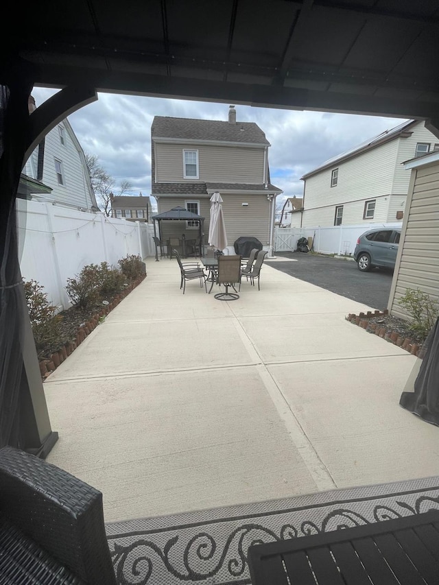 view of patio / terrace featuring outdoor dining space and a fenced backyard