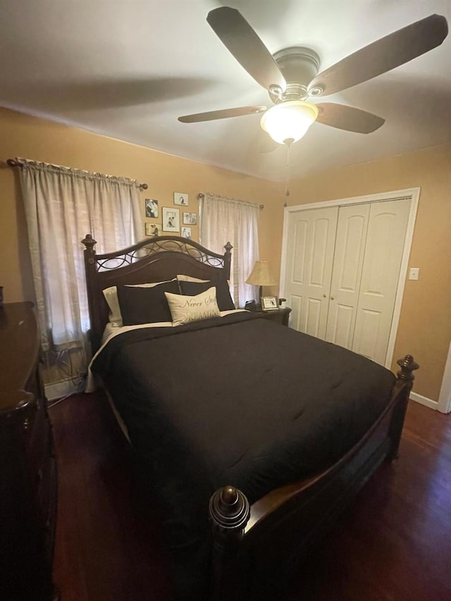 bedroom with a closet, ceiling fan, and wood finished floors