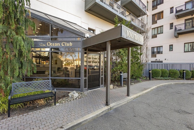 100 W Broadway Unit 4C, Long Beach, NY 11561 - view of exterior entry featuring fence