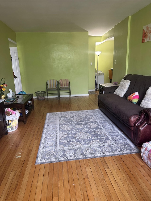 87-30 204th St Unit A78, Hollis, NY 11423 - living room featuring hardwood / wood-style floors and baseboards
