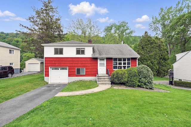 520 Washington Ave, Pleasantville, NY 10570 - tri-level home with a garage, a chimney, a front yard, driveway, and entry steps