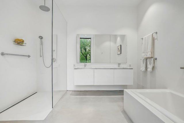 112 Wilson Park Dr, Tarrytown, NY 10591 - bathroom with walk in shower, a garden tub, and double vanity
