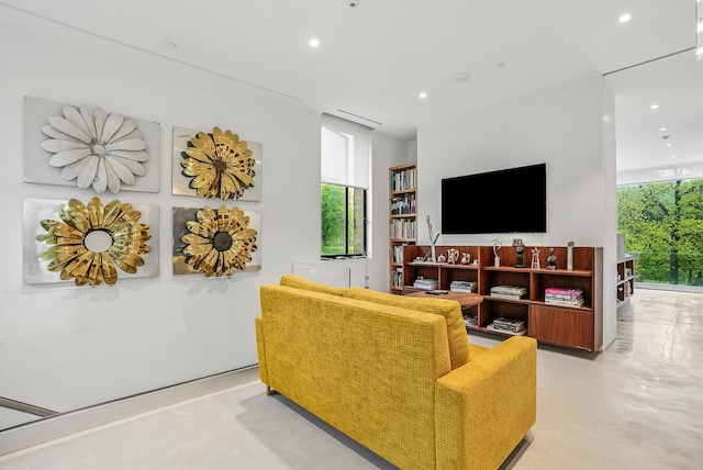112 Wilson Park Dr, Tarrytown, NY 10591 - living area featuring recessed lighting and concrete flooring