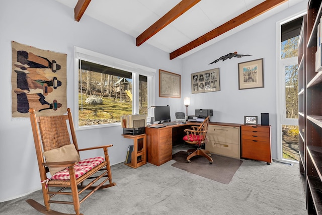 home office featuring light colored carpet and vaulted ceiling with beams
