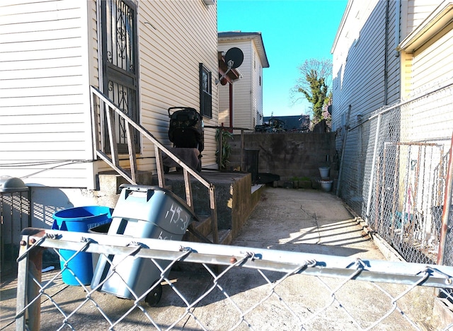 view of patio / terrace featuring fence