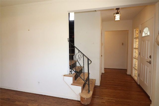entryway with stairs and wood finished floors