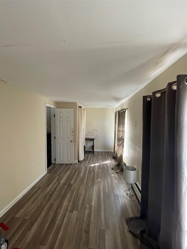340 Rte 52, Carmel, NY 10512 - interior space featuring dark wood-style flooring, baseboard heating, and baseboards