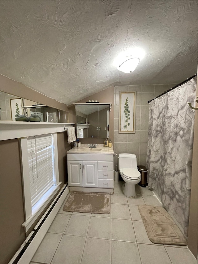 340 Rte 52, Carmel, NY 10512 - full bathroom featuring a textured ceiling, toilet, vaulted ceiling, tile walls, and tile patterned floors