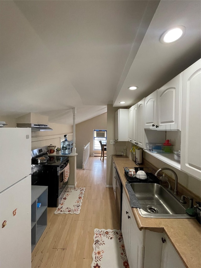 340 Rte 52, Carmel, NY 10512 - kitchen featuring light wood finished floors, a sink, black range with electric stovetop, vaulted ceiling, and white cabinets