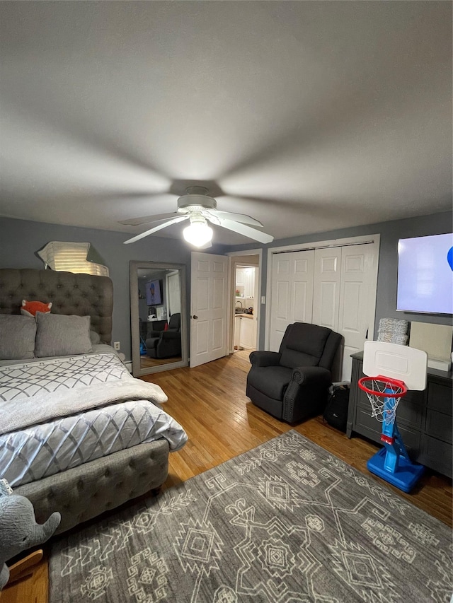 340 Rte 52, Carmel, NY 10512 - bedroom with wood finished floors, a ceiling fan, and a closet