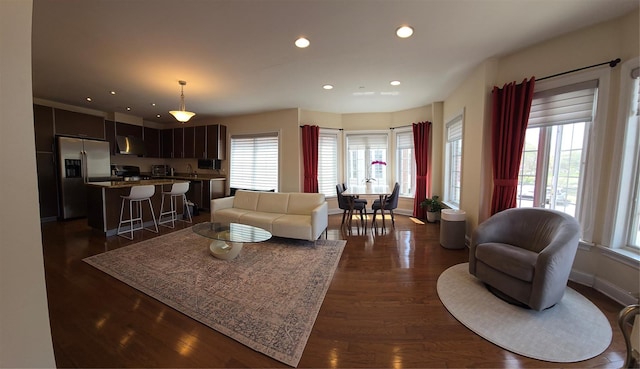 337 Park Cres, College Point, NY 11356 - living room with recessed lighting, dark wood-type flooring, and baseboards