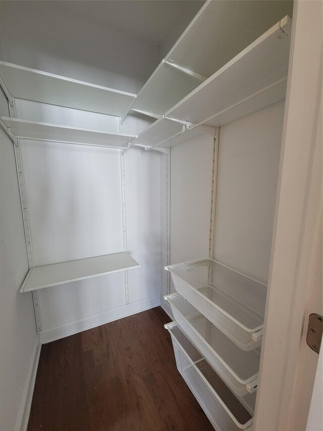 337 Park Cres, College Point, NY 11356 - walk in closet with wood finished floors