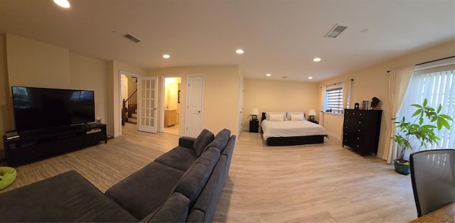 337 Park Cres, College Point, NY 11356 - living room with light wood-style floors, recessed lighting, and stairs
