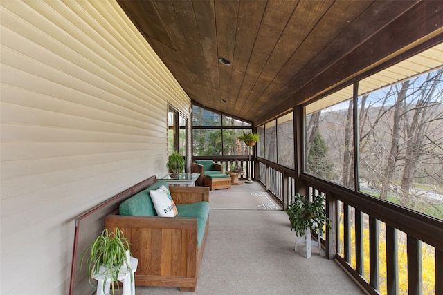 sunroom / solarium featuring an outdoor hangout area