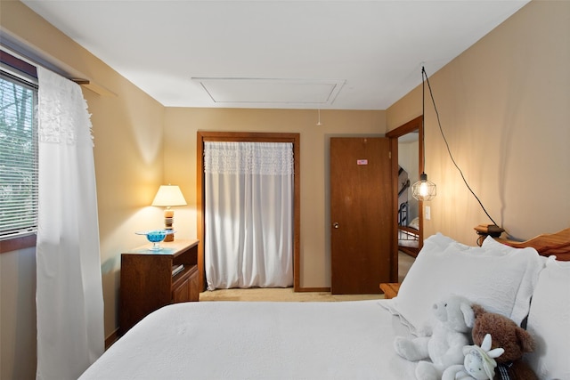 bedroom with attic access