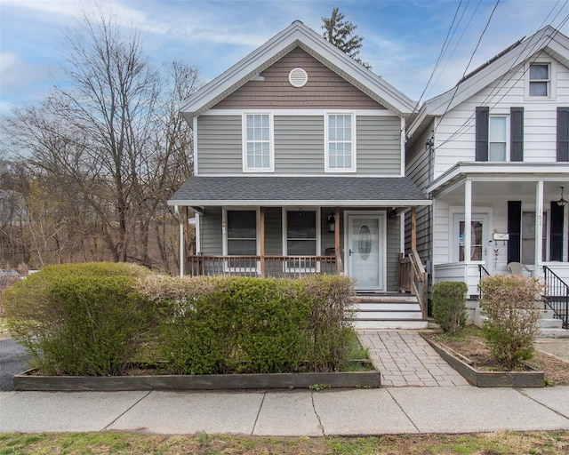 163 N Hamilton St, Poughkeepsie, NY 12601 - view of front facade featuring a porch and a shingled roof