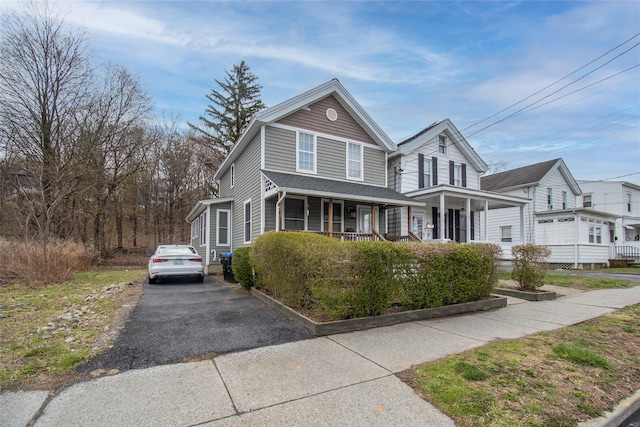163 N Hamilton St, Poughkeepsie, NY 12601 - view of front of house featuring a porch and aphalt driveway