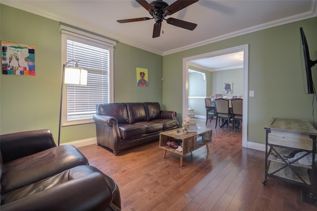 163 N Hamilton St, Poughkeepsie, NY 12601 - living area with ornamental molding, baseboards, wood finished floors, and ceiling fan