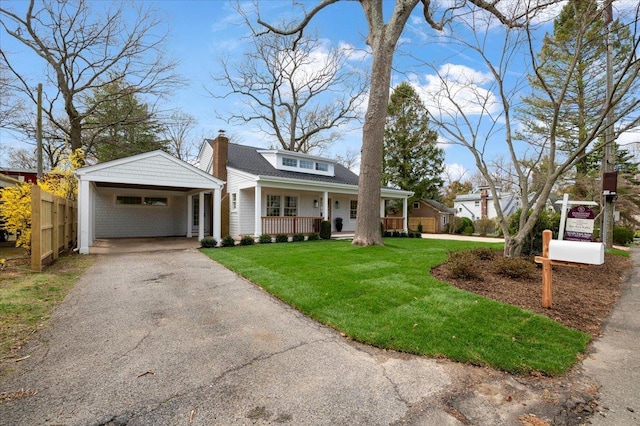 1000 Washington Dr, Centerport, NY 11721 - bungalow-style house with driveway, a porch, a chimney, and an attached carport